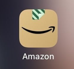 An image of the Amazon app download Apk. The logo features a stylized capital letter 'A’ in white colour, with a distinctive square design. The letter ‘A' is set against dark brown background. This logo is a symbol of Amazon app download Apk.